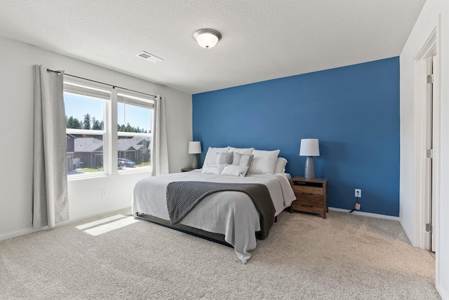 1225 E Paske Rd, Colbert, WA 99005 - carpeted bedroom with baseboards and a textured ceiling