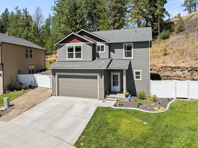 1225 E Paske Rd, Colbert, WA 99005 - view of front of property with an attached garage, a shingled roof, and concrete driveway