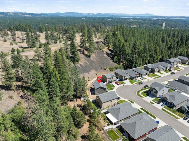 1225 E Paske Rd, Colbert, WA 99005 - aerial view of property's location with nearby suburban area and a mountain backdrop