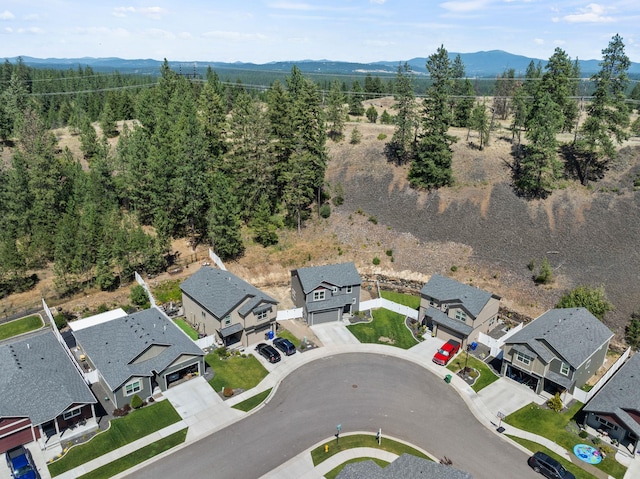 1225 E Paske Rd, Colbert, WA 99005 - aerial perspective of suburban area featuring a mountainous background