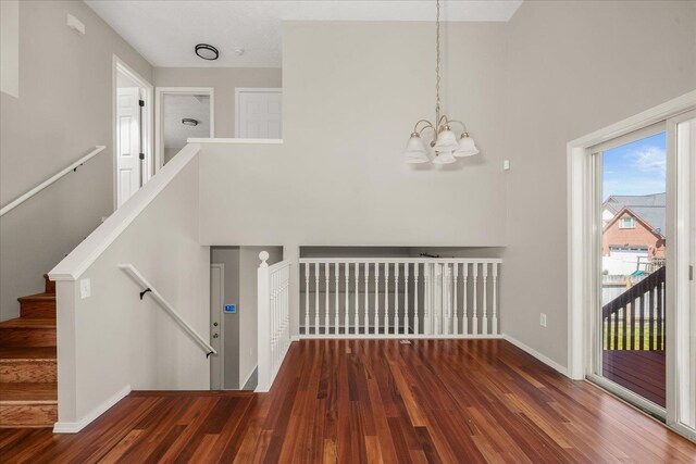 4407 E 14th Ave, Spokane, WA 99212 - staircase with a towering ceiling, a chandelier, and wood finished floors