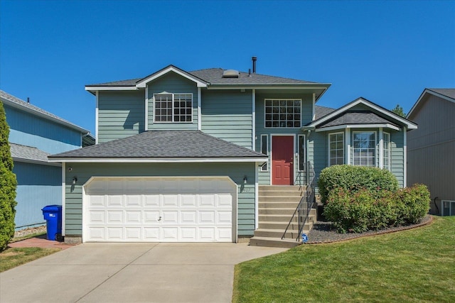 4407 E 14th Ave, Spokane, WA 99212 - split level home featuring concrete driveway and a shingled roof