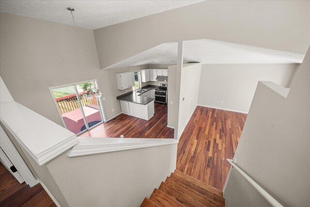 4407 E 14th Ave, Spokane, WA 99212 - stairway with wood finished floors and high vaulted ceiling