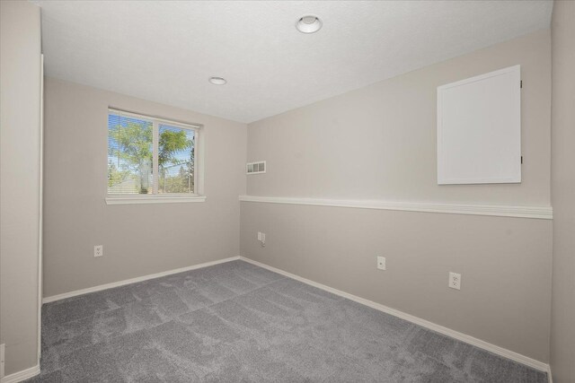4407 E 14th Ave, Spokane, WA 99212 - carpeted empty room featuring baseboards and recessed lighting