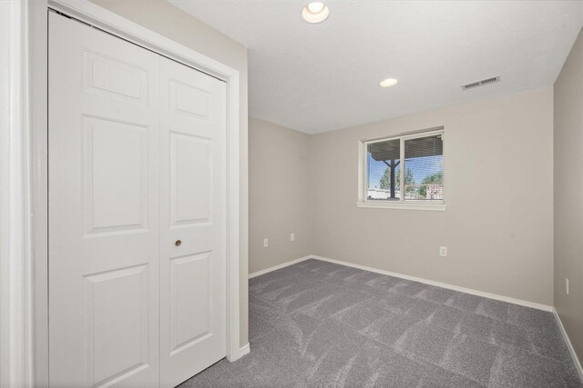 4407 E 14th Ave, Spokane, WA 99212 - unfurnished bedroom with carpet, a closet, and recessed lighting