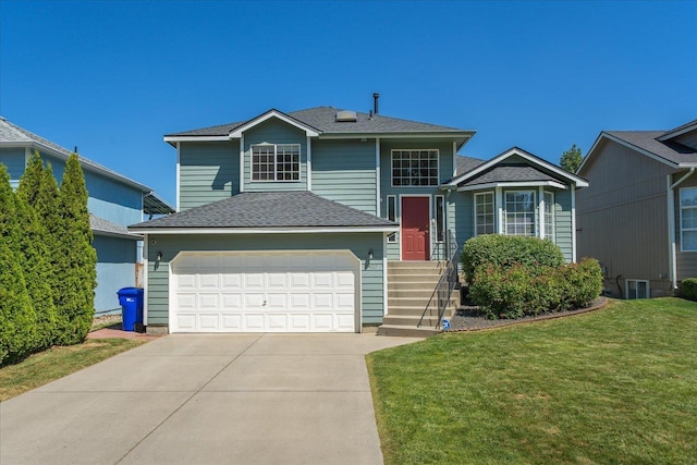 4407 E 14th Ave, Spokane, WA 99212 - tri-level home with concrete driveway, a front yard, and a shingled roof
