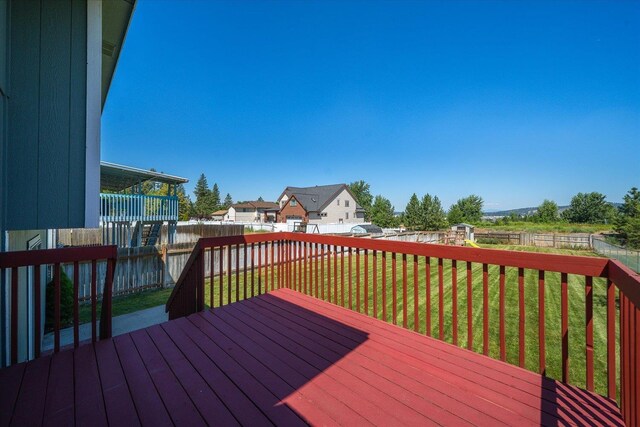 4407 E 14th Ave, Spokane, WA 99212 - wooden deck with a fenced backyard and a residential view