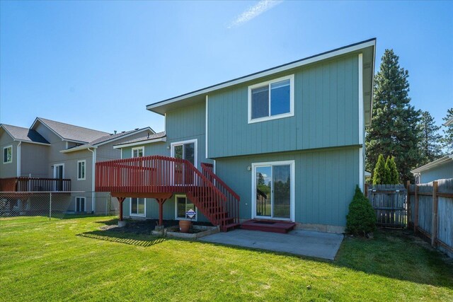 4407 E 14th Ave, Spokane, WA 99212 - rear view of property featuring a fenced backyard, a wooden deck, stairs, and a patio