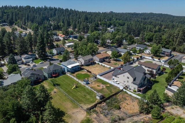 4407 E 14th Ave, Spokane, WA 99212 - aerial view of property's location featuring a forest and nearby suburban area