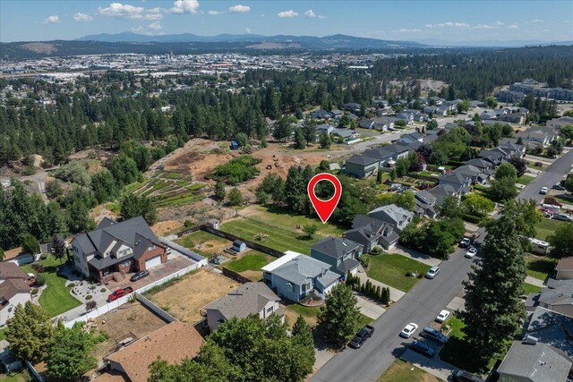 4407 E 14th Ave, Spokane, WA 99212 - aerial overview of property's location featuring nearby suburban area and mountains