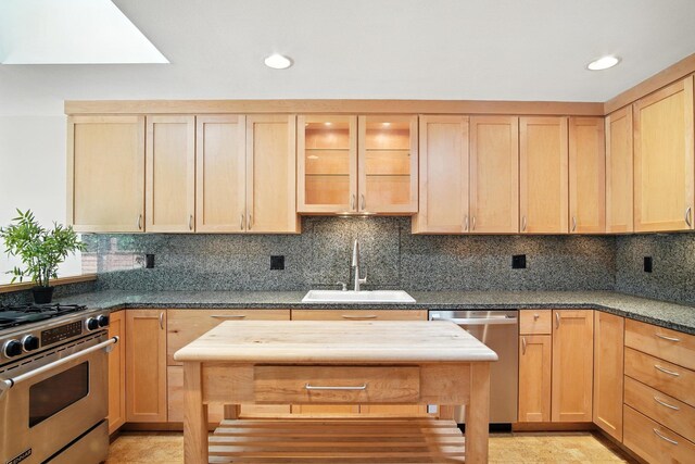 3121 S Manito Blvd, Spokane, WA 99203 - kitchen featuring appliances with stainless steel finishes, light brown cabinets, recessed lighting, and backsplash