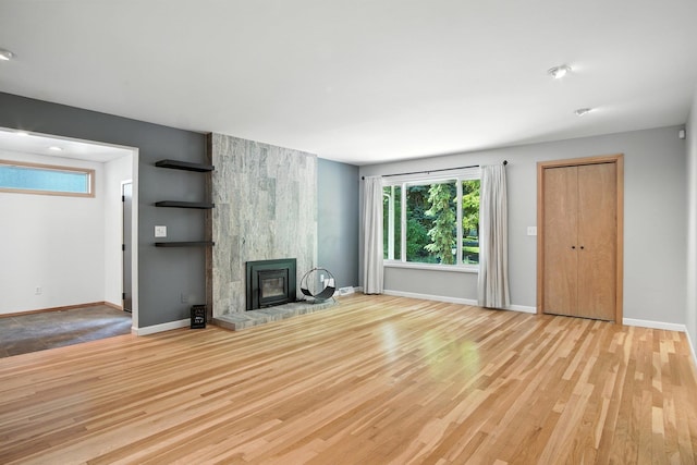 3121 S Manito Blvd, Spokane, WA 99203 - unfurnished living room with wood finished floors and a fireplace