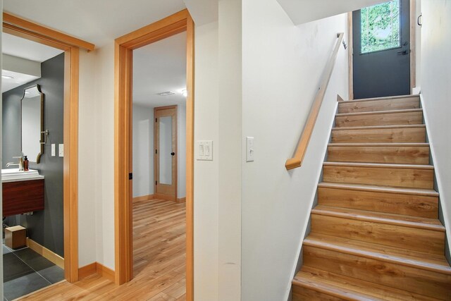 3121 S Manito Blvd, Spokane, WA 99203 - stairway with baseboards and wood finished floors