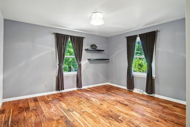 3121 S Manito Blvd, Spokane, WA 99203 - empty room featuring wood finished floors and baseboards