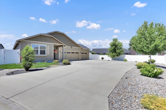 8812 W Pirates Ct, Spokane, WA 99224 - ranch-style home featuring concrete driveway and a garage