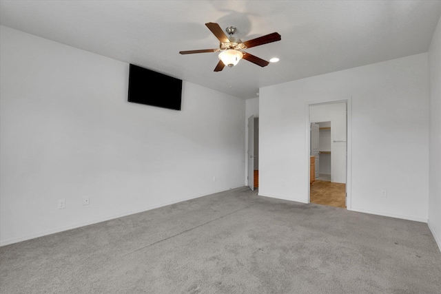 8812 W Pirates Ct, Spokane, WA 99224 - unfurnished bedroom with carpet floors, recessed lighting, a ceiling fan, and a spacious closet