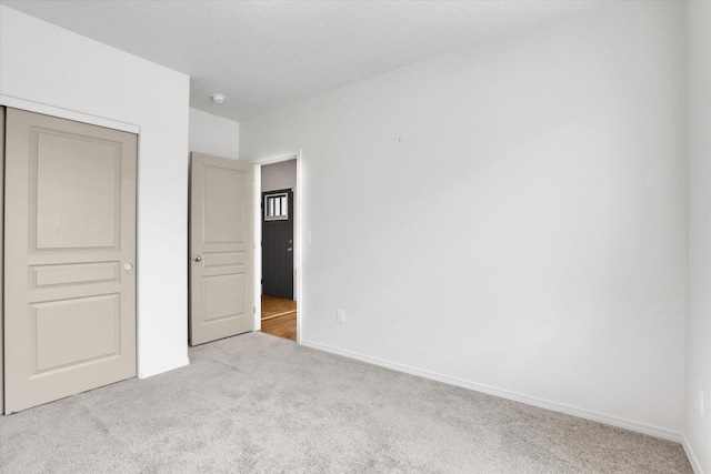 8812 W Pirates Ct, Spokane, WA 99224 - unfurnished bedroom with carpet flooring and a closet