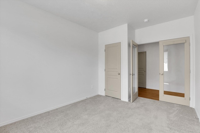 8812 W Pirates Ct, Spokane, WA 99224 - unfurnished bedroom featuring light colored carpet and baseboards
