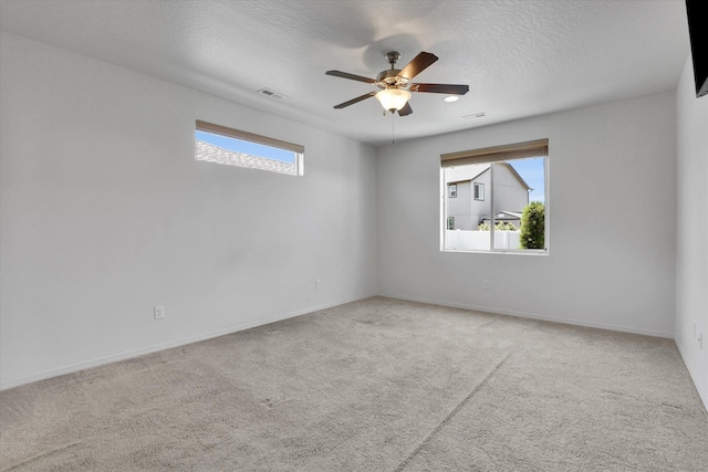 8812 W Pirates Ct, Spokane, WA 99224 - carpeted spare room with ceiling fan and a textured ceiling