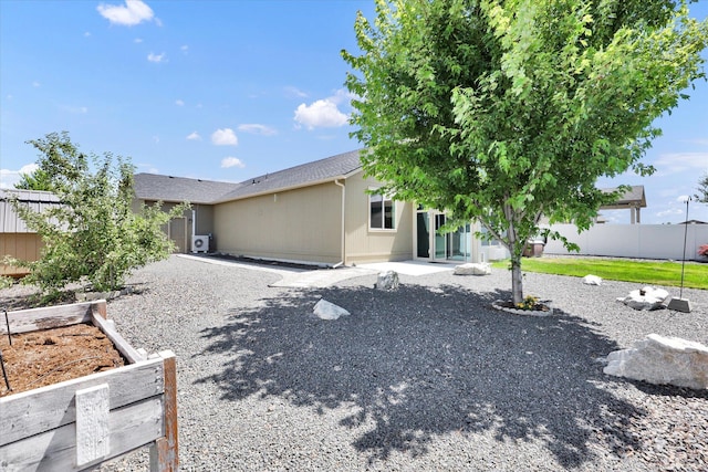 8812 W Pirates Ct, Spokane, WA 99224 - back of house with a garden