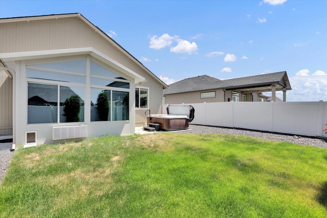 8812 W Pirates Ct, Spokane, WA 99224 - view of yard with a hot tub and a sunroom