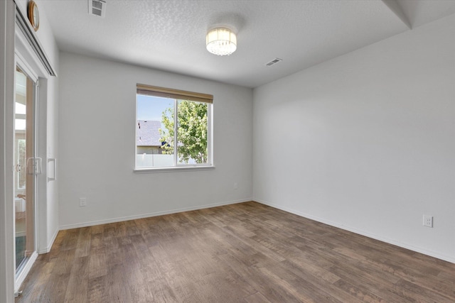 8812 W Pirates Ct, Spokane, WA 99224 - empty room featuring wood finished floors and baseboards
