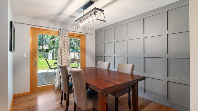 811 W Teal Ave, Spokane, WA 99218 - dining room featuring light wood finished floors and a chandelier