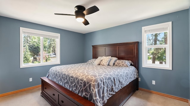 811 W Teal Ave, Spokane, WA 99218 - bedroom with light colored carpet and ceiling fan