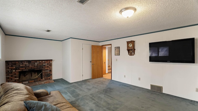 811 W Teal Ave, Spokane, WA 99218 - living room with carpet flooring, a textured ceiling, a fireplace, and ornamental molding