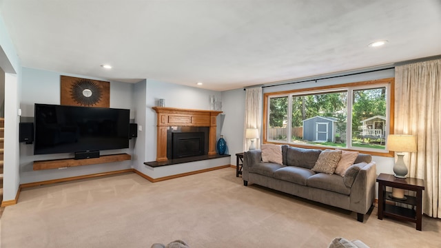 811 W Teal Ave, Spokane, WA 99218 - living room featuring light carpet, recessed lighting, and a fireplace with raised hearth