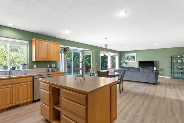 3421 S Mcdonald St, Spokane Valley, WA 99206 - kitchen featuring stainless steel dishwasher, light wood finished floors, a center island, plenty of natural light, and recessed lighting