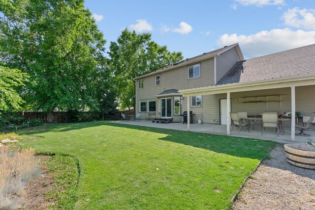 3421 S Mcdonald St, Spokane Valley, WA 99206 - rear view of property with a patio, a fenced backyard, and entry steps