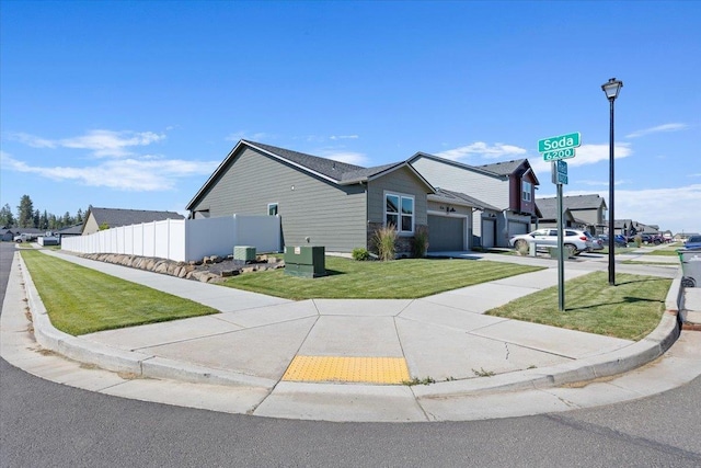 8403 W Red Ave, Cheney, WA 99004 - view of side of property featuring a garage and driveway