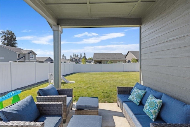 8403 W Red Ave, Cheney, WA 99004 - fenced backyard with an outdoor living space, a residential view, and a patio area