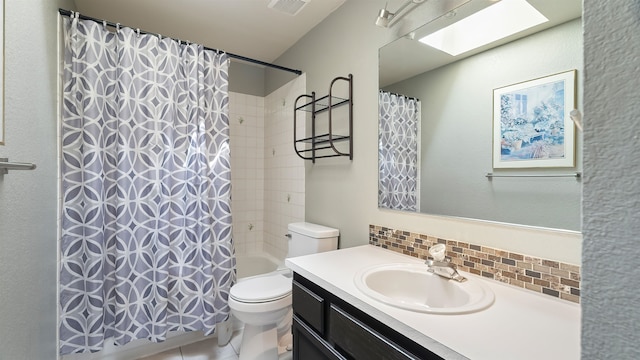 5623 W Lyons Ct, Spokane, WA 99208 - bathroom with tasteful backsplash, vanity, shower / tub combo with curtain, and a skylight