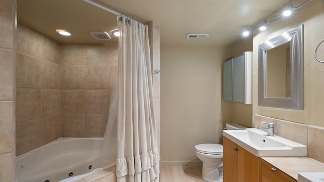 5623 W Lyons Ct, Spokane, WA 99208 - bathroom with vanity and a combined bath / shower with jetted tub