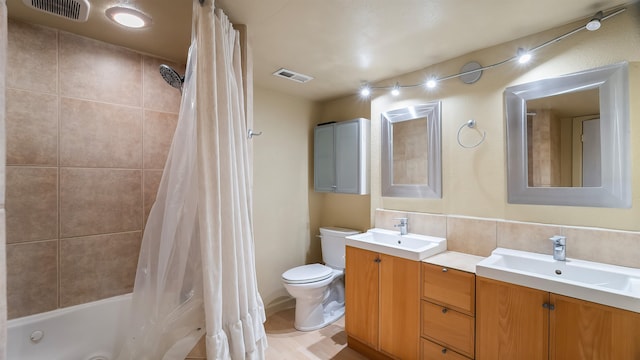 5623 W Lyons Ct, Spokane, WA 99208 - bathroom with double vanity and shower / bath combination with curtain