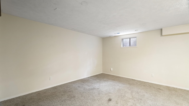 5623 W Lyons Ct, Spokane, WA 99208 - below grade area with carpet flooring and a textured ceiling