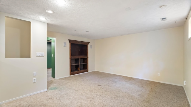 5623 W Lyons Ct, Spokane, WA 99208 - carpeted spare room featuring recessed lighting, a textured ceiling, and a smoke detector