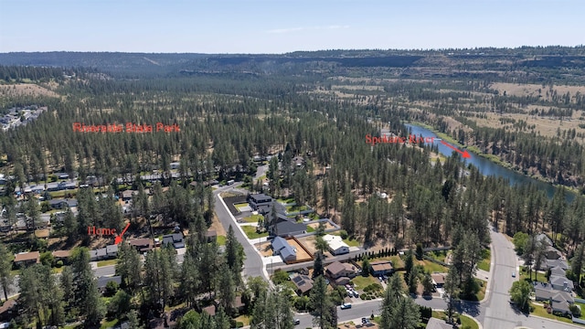 5623 W Lyons Ct, Spokane, WA 99208 - view of property location featuring a heavily wooded area and a nearby body of water