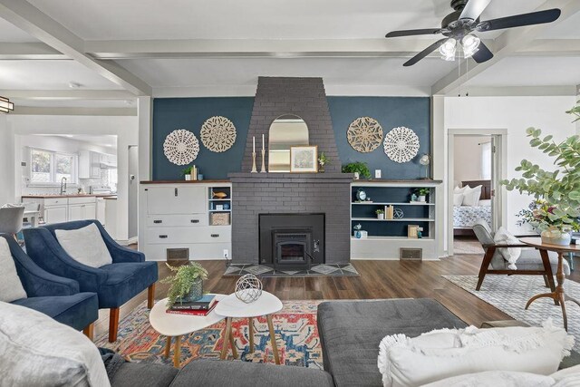 3129 E 34th Ave, Spokane, WA 99223 - living room with beamed ceiling, wood finished floors, and a ceiling fan