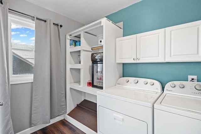 3129 E 34th Ave, Spokane, WA 99223 - washroom with washer and dryer, cabinet space, and dark wood-style flooring