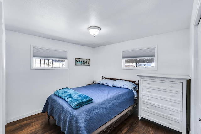 5917 N Addison St, Spokane, WA 99208 - bedroom featuring dark wood finished floors and baseboards