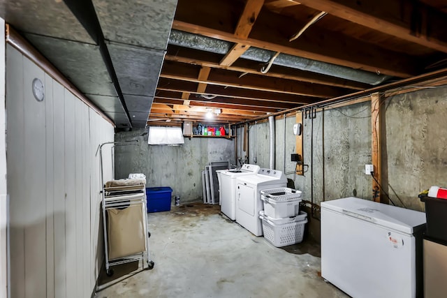 5917 N Addison St, Spokane, WA 99208 - unfinished basement featuring refrigerator and separate washer and dryer