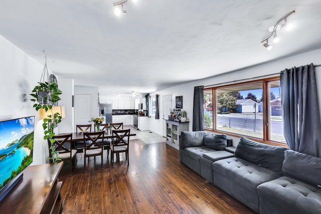 5917 N Addison St, Spokane, WA 99208 - living room with rail lighting and hardwood / wood-style floors
