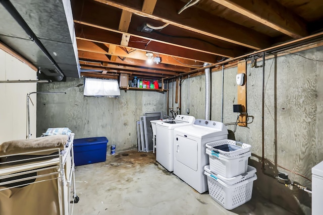 5917 N Addison St, Spokane, WA 99208 - unfinished basement featuring washing machine and dryer