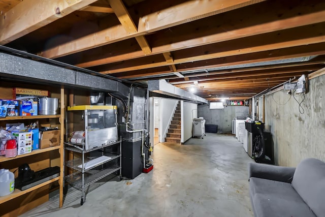 5917 N Addison St, Spokane, WA 99208 - unfinished below grade area with washer and dryer and stairs
