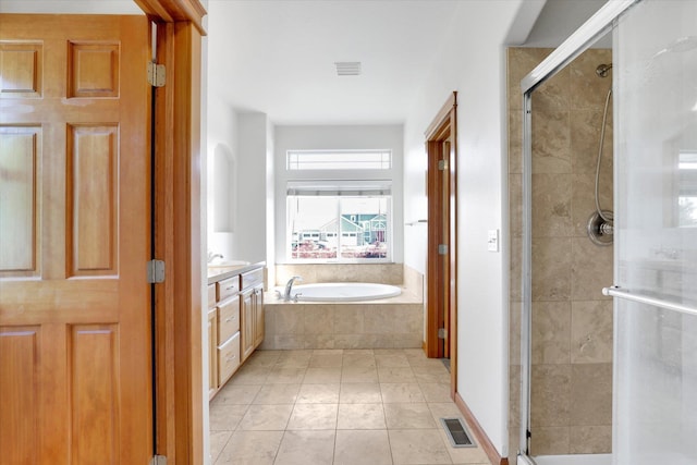 2312 W Abigail Ct, Spokane, WA 99208 - bathroom featuring a bath, a shower stall, tile patterned flooring, and vanity