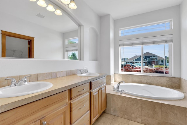 2312 W Abigail Ct, Spokane, WA 99208 - bathroom with double vanity, a bath, and tile patterned floors
