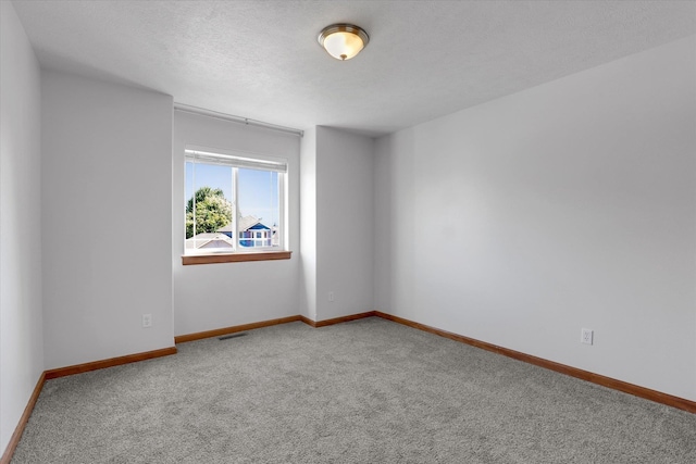 2312 W Abigail Ct, Spokane, WA 99208 - carpeted spare room with baseboards
